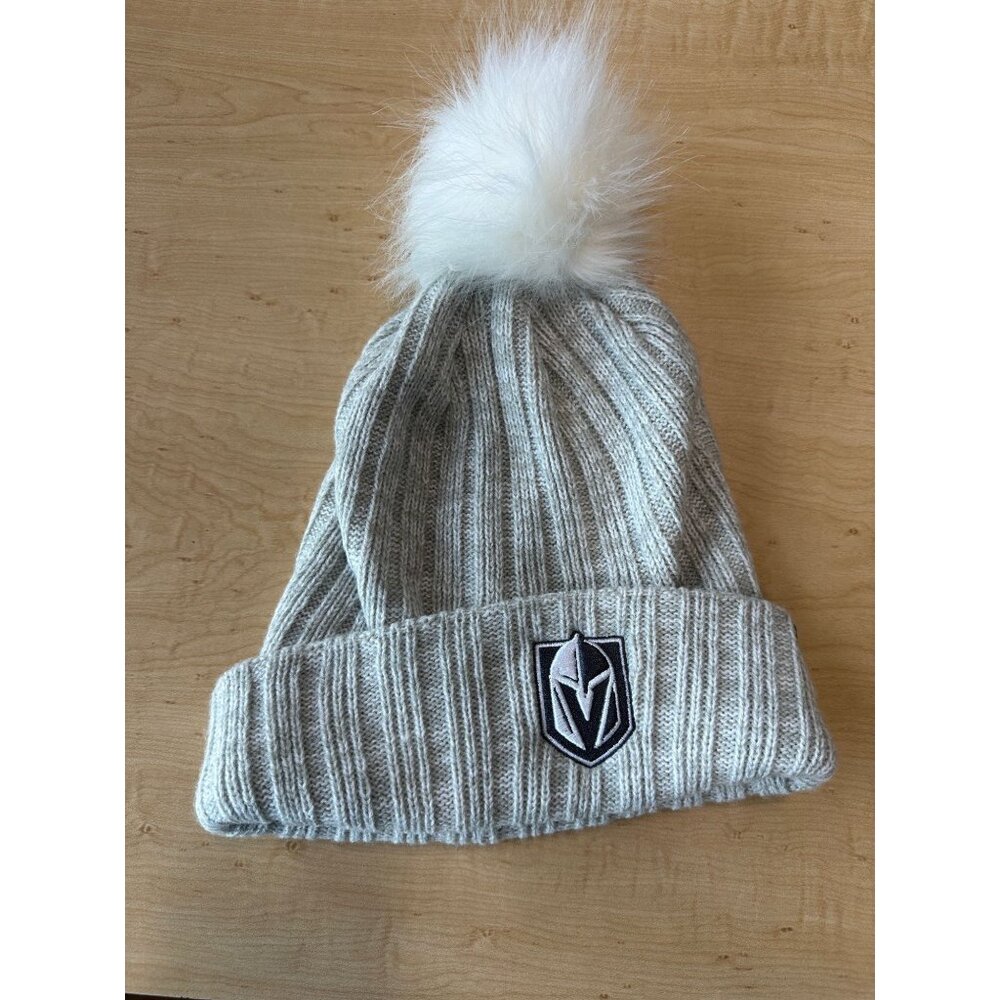 Light grey Vegas Golden Knights Fanatics womens cuffed knit hat with white pom,